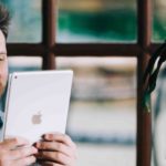 man reading ebook on a tablet