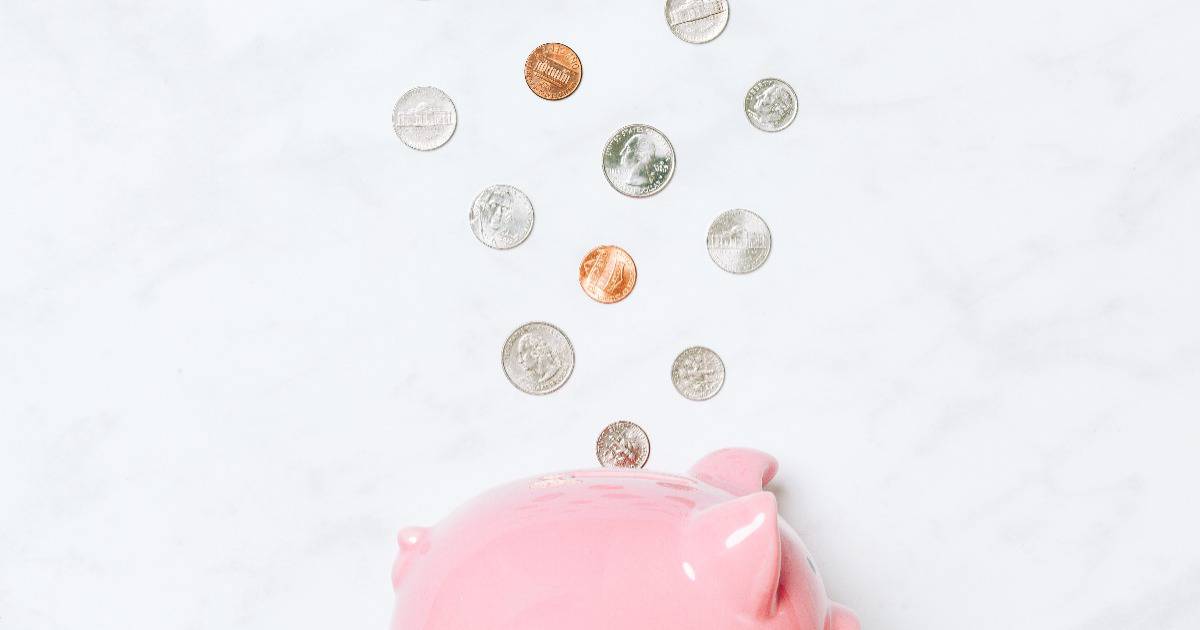 piggy bank with coins used to help teach kids stewardship