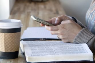 church member doing Bible study at coffee shop
