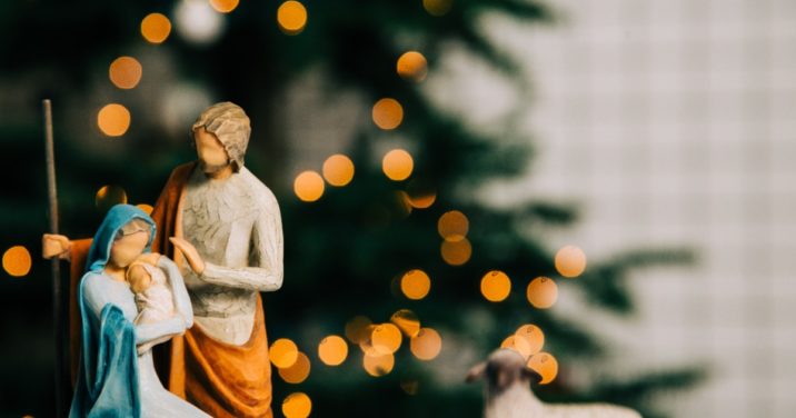 woodwork nativity scene, header for Christian Christmas songs post