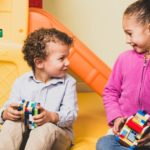 children playing in nursery after church's child check-in process